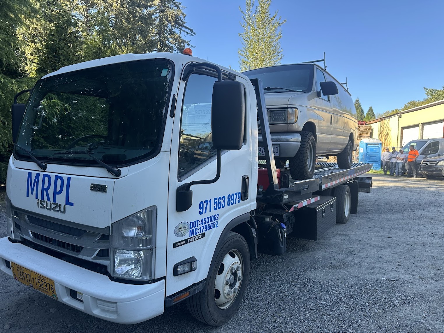 MRPL Towing truck at a customer location